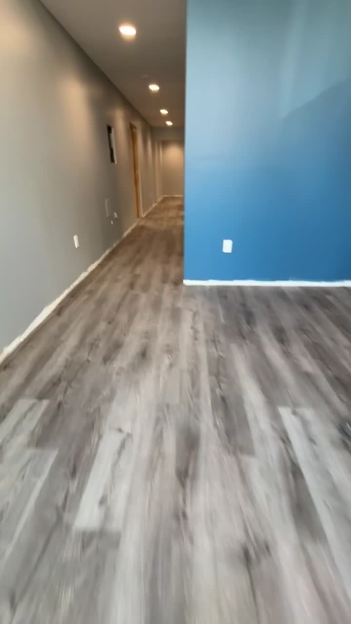 Video walkthrough of the gray plank flooring project